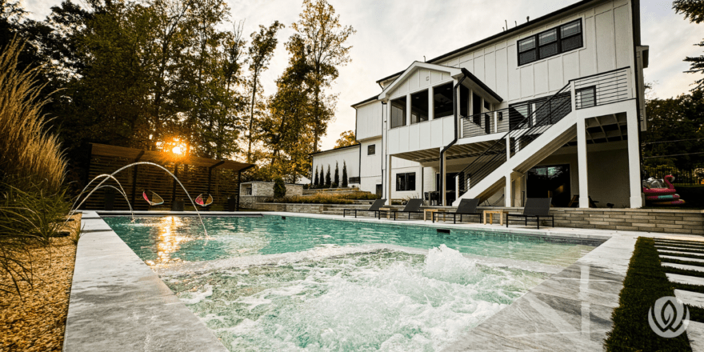 Custom pool beside modern home
